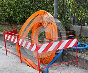 Roadworks with pipeline to instal fibre optical cables