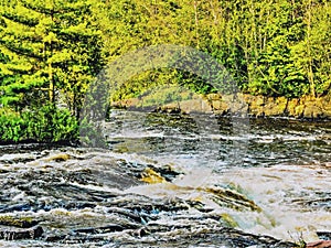 Roaring water cascade on a river bend