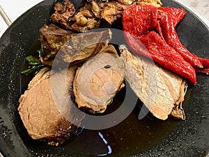 Roast Beef with Fried Vegetables in Black Plate