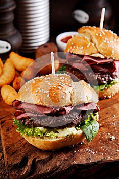 Roast beef or pastrami burger on a sesame bun