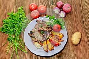 Roast beef rib eye flato with pita bread, tomato, potato veggies, onion and coriander served in dish isolated on table top view of