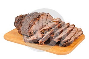 Roast beef on a wooden board