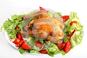 Roast chicken on a bed of salad