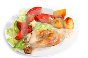 Roast chicken dinner with salad