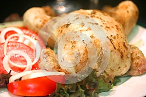 Roast chicken with fresh tomato salad