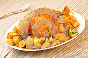 Roast chicken with potatoes