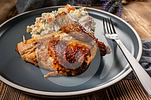 Roast chicken served with russian traditional salad