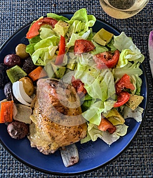 Roast chicken thigh and salad