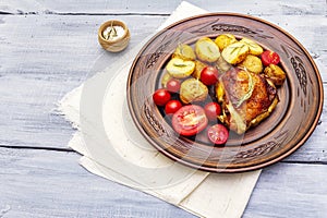 Roast chicken thighs and baby potatoes