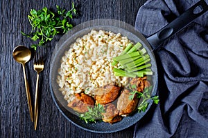 Roast chicken thighs with pasta in a skillet