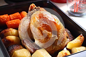 Roast chicken in tray A