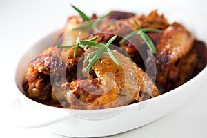 Roast chicken wings with rosemary