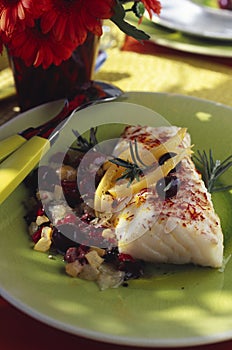 Roast cod with olives and confit citrus photo