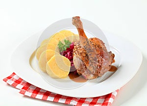 Roast duck with potato dumplings and red cabbage