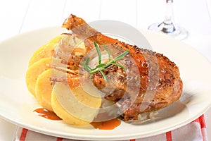 Roast duck with potato dumplings and white cabbage