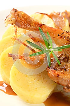 Roast duck with potato dumplings and white cabbage