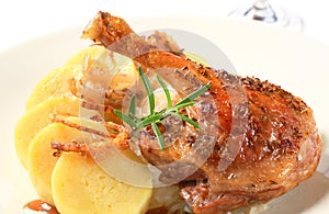 Roast duck with potato dumplings and white cabbage