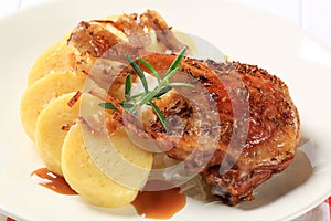 Roast duck with potato dumplings and white cabbage