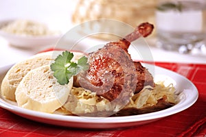 Roast duck with sauerkraut and dumplings