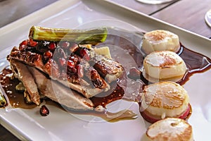 Roast duck with seared scallops at a winery restaurant