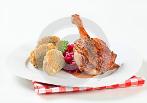 Roast duck with Tyrolean dumplings and red cabbage