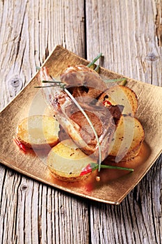 Roast lamb chops and potatoes