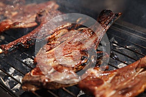 Roast lamb steak on the grill.