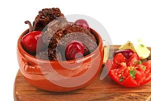 Roast meat in pot with vegetables