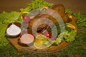 Roast partridge with fresh vegetables.