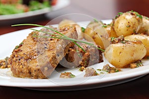 Roast pork with baby potatoes