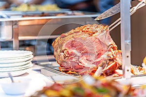 roast pork ham on a catering table