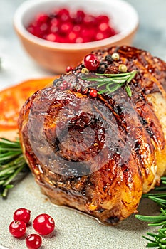 Roast pork meat roll with spices and cranberry. Food recipe background. Close up