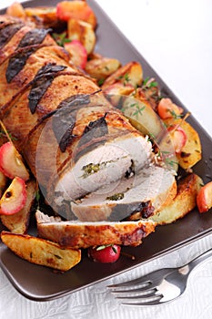 Roast pork with sage and thyme