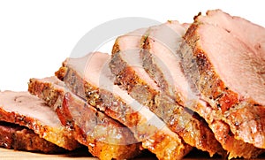 Roast pork on a wooden board