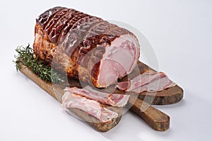 Roast pork on wooden board