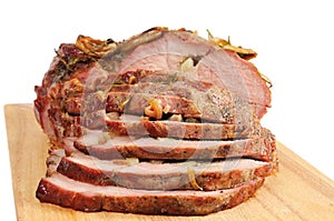 Roast pork on a wooden board