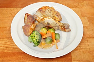 Roast poussin and vegetables photo