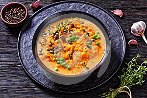 Roast sweet potato and carrot soup with green peas