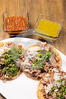 Roast tacos with corn tortillas. Mexican tacos. traditional mexican food concept on wooden table