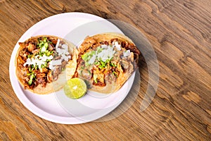 Roast tacos with corn tortillas. Mexican tacos. traditional mexican food concept on wooden table