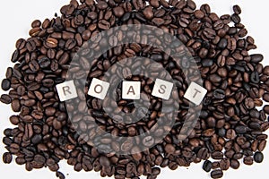 ROAST white cube text AND coffee beans background