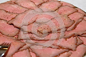 Roastbeef on plate for selfservice photo