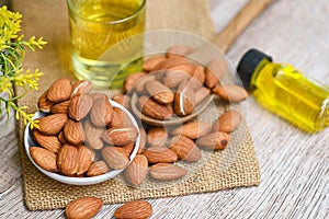 Roasted almond nut for healthy food and snack organic vegetable oils for cooking or spa concept, Almond oil and Almonds nuts on