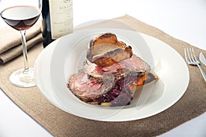 Roasted beef Dish dinner with wine