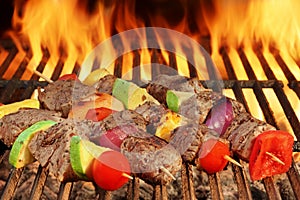 Roasted Beef Kebabs With Vegetables On BBQ Flaming Grill