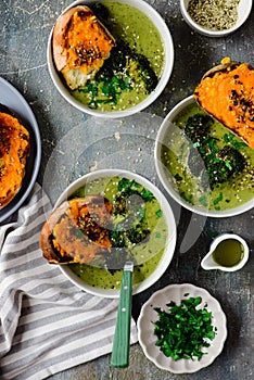 Roasted broccoli soup with melted cheddar croutons.style hugge.selective focus