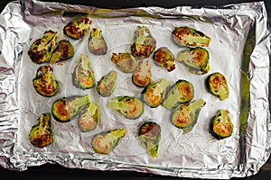 Roasted Brussels Sprout Haves on a Foil-Lined Sheet Pan