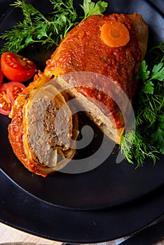 A Roasted cabbage rolls with rice and minced meat according to the recipe of omas