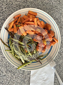 Roasted carrots, green beans and tomatoes