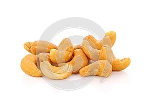 Roasted cashew nuts whith salt on white background